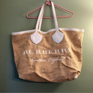 - Burberry- Raffia Logo Giant Tote Bag.
